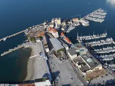 Una foto del molo Teresiano e Lanterna (come era). Foto Bruni