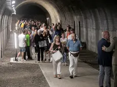 Il numeroso pubblico all’inaugurazione della Galleria e i pannelli multimediali (foto Katia Bonaventura)