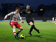 Il difensore centrale Alessandro Ligi in azione con la maglia della Triestina (foto Andrea Lasorte)