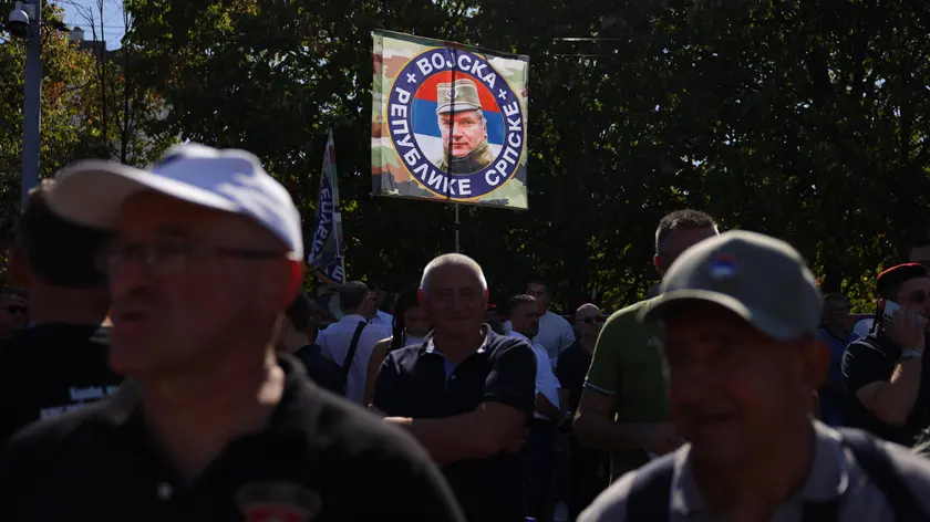 epa13219599 Supporters wave a flag depicting Ratko Mladic during his funeral in Belgrade, Serbia, 07 September 2026. Former Bosnian Serb general Ratko Mladic, who was convicted of war crimes by the International Criminal Tribunal for the Former Yugoslavia (ICTY) in 2017, died on 27 August 2026 at the age of 84. EPA/ANDREJ CUKIC