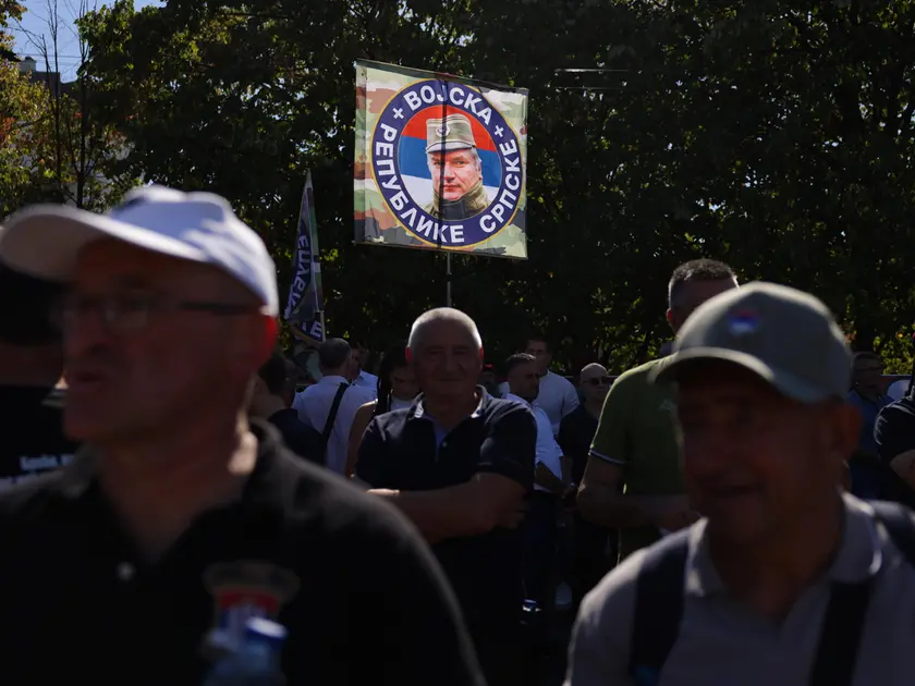 epa13219599 Supporters wave a flag depicting Ratko Mladic during his funeral in Belgrade, Serbia, 07 September 2026. Former Bosnian Serb general Ratko Mladic, who was convicted of war crimes by the International Criminal Tribunal for the Former Yugoslavia (ICTY) in 2017, died on 27 August 2026 at the age of 84. EPA/ANDREJ CUKIC