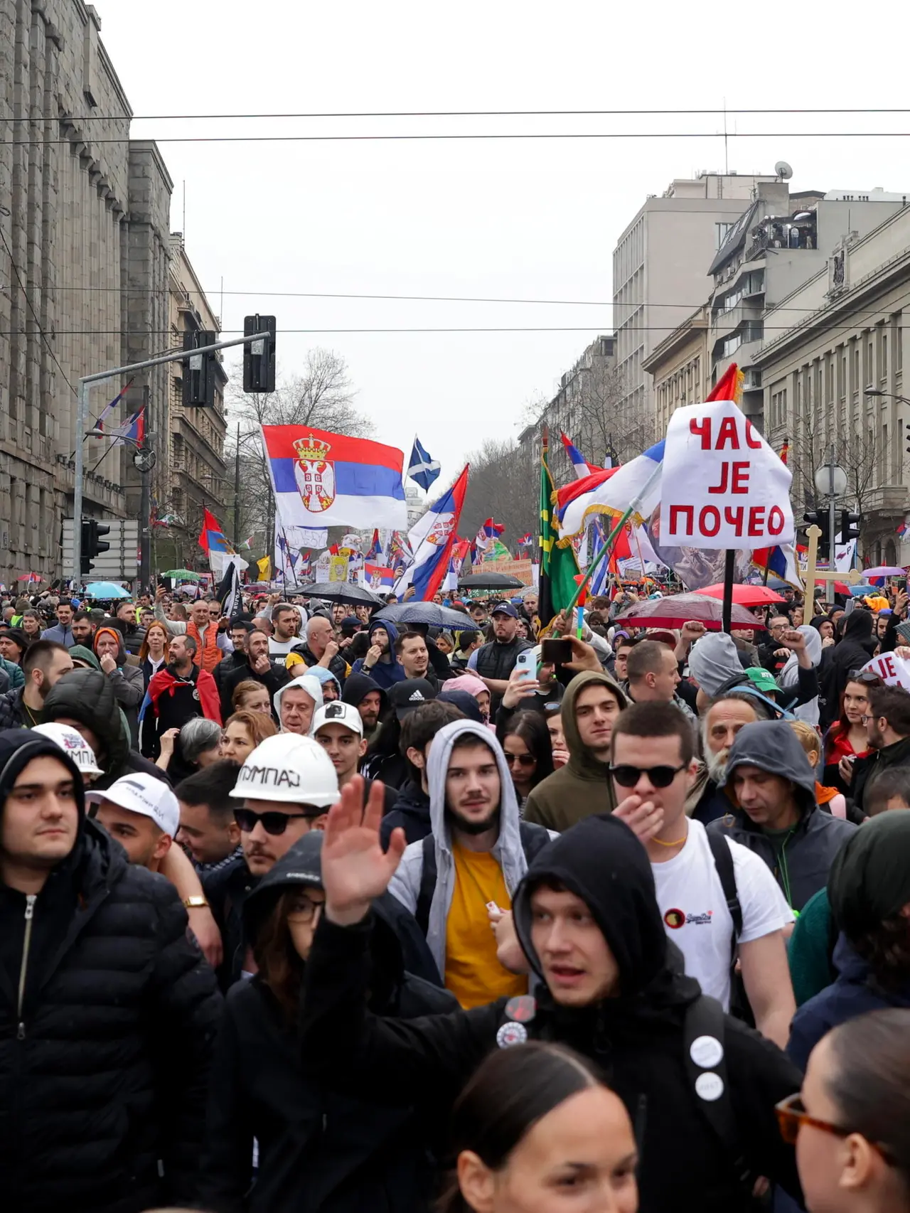 epa11966398 Protesters wave Serbian flags during the student-led rally in Belgrade, Serbia, 15 March 2025. University students staged a protest, demanding accountability after fifteen people lost their lives in the collapse of the Novi Sad Railway Station canopy in November 2024. The station building, which had been renovated and reopened in July 2024, was undergoing further renovations shortly before the collapse. EPA/ANDREJ CUKIC