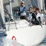 Un equipaggio misto in regata in uno degli anni passati