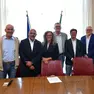La firma per l'accordo in Comune (foto Bruni)