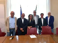 La firma per l'accordo in Comune (foto Bruni)