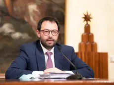 A handout photo made available by the Chigi Palace Press Office shows Italian Minister of Economic Development, Stefano Patuanelli, while attends a press conference during a break of the Cabinet for the "Relaunch" Law Decree (dl Rilancio) at the Chigi Palace in Rome, Italy, 13 May 2020. ANSA/CHIGI PALACE PRESS OFFICE/FILIPPO ATTILI +++ ANSA PROVIDES ACCESS TO THIS HANDOUT PHOTO TO BE USED SOLELY TO ILLUSTRATE NEWS REPORTING OR COMMENTARY ON THE FACTS OR EVENTS DEPICTED IN THIS IMAGE; NO ARCHIVING; NO LICENSING +++