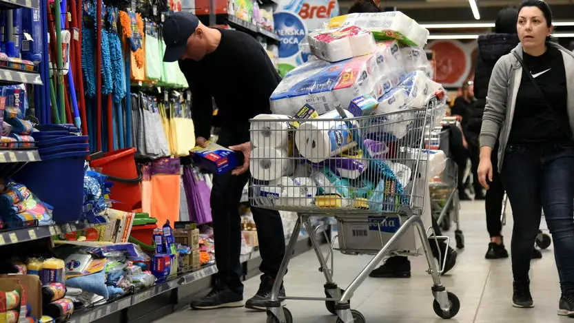 epa08301249 Shoppers stock up on supplies at a supermarket in Podgorica, Montenegro, 17 March 2020. Several European countries have closed borders, schools and public facilities, and have cancelled major sports and entertainment events in order to prevent the spread of the covid-19 disease. EPA/BORIS PEJOVIC