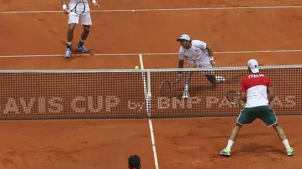 epa05771211 Italy's Fabio Fognini (down-L) and Simone Bolelli (down-R) in action against Argentina's Carlos Berlocq (top-R) and Leonardo Mayer (top-L) during their doubles match for the Davis Cup World Group first round tie between Argentina and Italy in Buenos Aires, Argentina, 04 February 2017. EPA/DAVID FERNANDEZ
