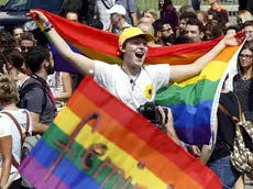 epa07827712 Participants carry placards and rainbow colored flags during Sarajevo's first-ever gay pride parade, in Sarajevo, Bosnia and Herzegovina, 08 September 2019. Representatives of LGBT (Lesbian, Gay, Bisexual and Transgender) organisations and their supporters took part in the event that also commemorates the 50th anniversary of the so-called Stonewall Riots in New York City, USA, when a police raid at the Stonewall Inn in Greenwich Village in 1969 sparked riots that were leading to the gay liberation movement. EPA/FEHIM DEMIR