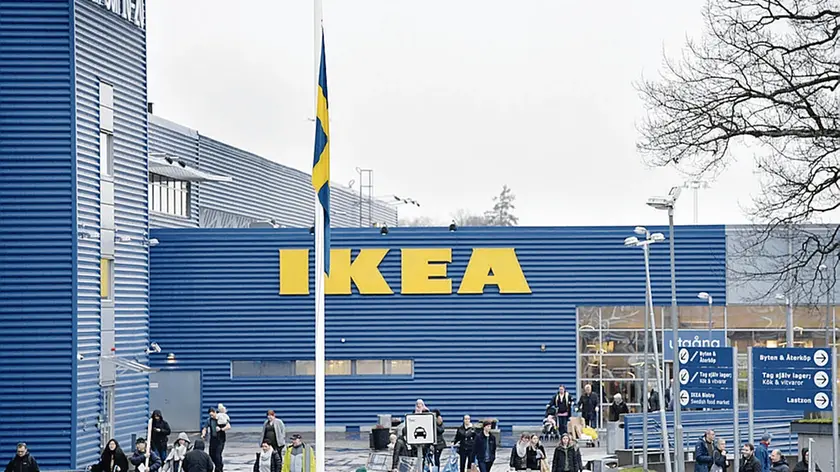epa06481474 A Swedish flag flies at half mast outside an IKEA store in Stockholm, Sweden, 28 January 2018. Ingvar Kamprad, the founder of Swedish multinational furniture retailer IKEA has died at the age of 91. EPA/ANDERS WIKLUND SWEDEN OUT