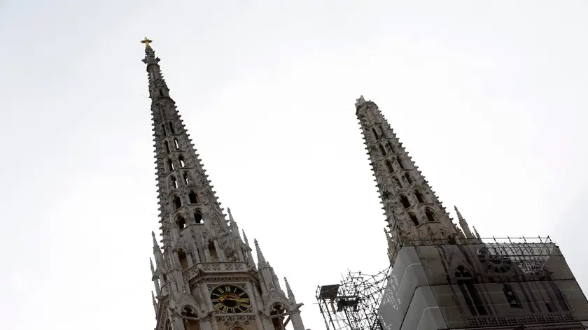 One of the damaged spires, right, of Zagreb\'s iconic cathedral is seen after an earthquake in Zagreb, Croatia, Sunday, March 22, 2020. The cathedral was rebuilt after it toppled in the 1880 earthquake. A strong earthquake shook Croatia and its capital on Sunday, causing widespread damage and panic. (AP Photo/Darko Bandic)