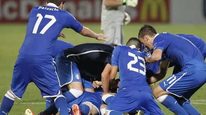 Italian players celebrate after they scored during the European U21 Soccer Championship Group A match against Norway in Bloomfield stadium in Tel Aviv, Israel, Tuesday, June11, 2013. (AP Photo/Ariel Schalit)