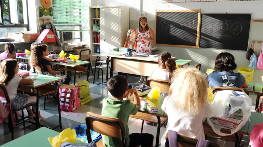 Il primo giorno di scuola per gli alunni dell'Istituto Comprensivo Padre Gemelli di Torino, 12 settembre 2011. ANSA / DI MARCO