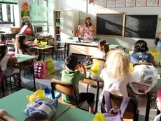 Il primo giorno di scuola per gli alunni dell'Istituto Comprensivo Padre Gemelli di Torino, 12 settembre 2011. ANSA / DI MARCO