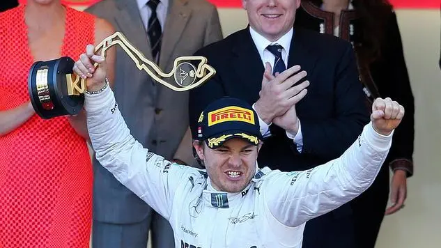 epa03718621 Winner German Formula One driver Nico Rosberg of Mercedes AMG celebrates after the 2013 Formula One Grand Prix of Monaco at the Monte Carlo circuit in Monaco, 26 May 2013. Rosberg gave Mercedes a first victory of the Formula One season when he captured the Monaco Grand Prix from pole position. EPA/SRDJAN SUKI