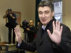 Foto LaPresse.estero.4 12 2011 .Elezioni in Croazia .Nella Foto Zoran Milanovic ..Opposition leader Zoran Milanovic reacts after casting his ballot at a polling station in Zagreb, Croatia, Sunday, Dec. 4, 2011. Croatians are voting in an election that is expected to unseat the conservative government ahead of the country's entry into the European Union.