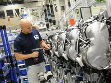 A file photo dated 28 June 2012 showing a Volkswagen employee working on an MDB diesel engine at the Volkswagen plant in Salzgitter, Germany, 28 June 2012. The VW factory celebrated the production of its 50 millionth engine on 28 June 2012. German industrial production unexpectedly fell in May, data released 08 July 2013 showed. Output in Europe's biggest economy slumped by one per cent in May in comparison to the month before after it rose by an upwardly revised 2 per cent in April, the Ministry for Economics said. Analysts had expected a smaller decline in May of 0.5 per cent. ANSA/JULIAN STRATENSCHULTE
