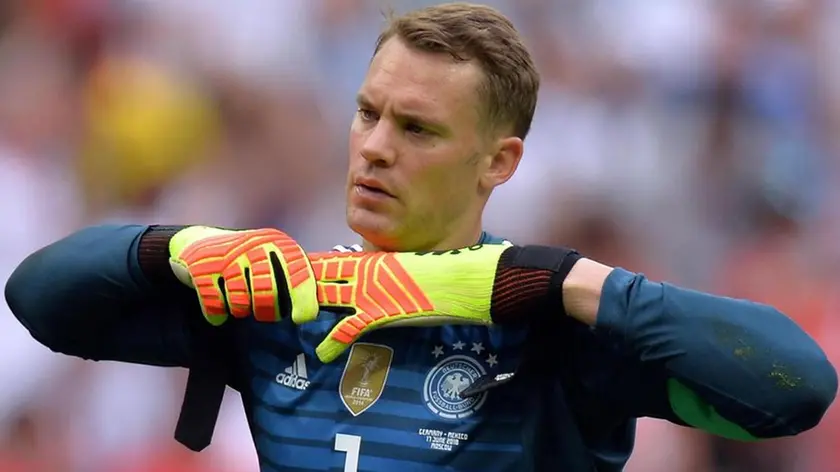 epa06816237 Goalkeeper Manuel Neuer of Germany reacts during the FIFA World Cup 2018 group F preliminary round soccer match between Germany and Mexico in Moscow, Russia, 17 June 2018. (RESTRICTIONS APPLY: Editorial Use Only, not used in association with any commercial entity - Images must not be used in any form of alert service or push service of any kind including via mobile alert services, downloads to mobile devices or MMS messaging - Images must appear as still images and must not emulate match action video footage - No alteration is made to, and no text or image is superimposed over, any published image which: (a) intentionally obscures or removes a sponsor identification image; or (b) adds or overlays the commercial identification of any third party which is not officially associated with the FIFA World Cup) EPA/PETER POWELL EDITORIAL USE ONLY EDITORIAL USE ONLY