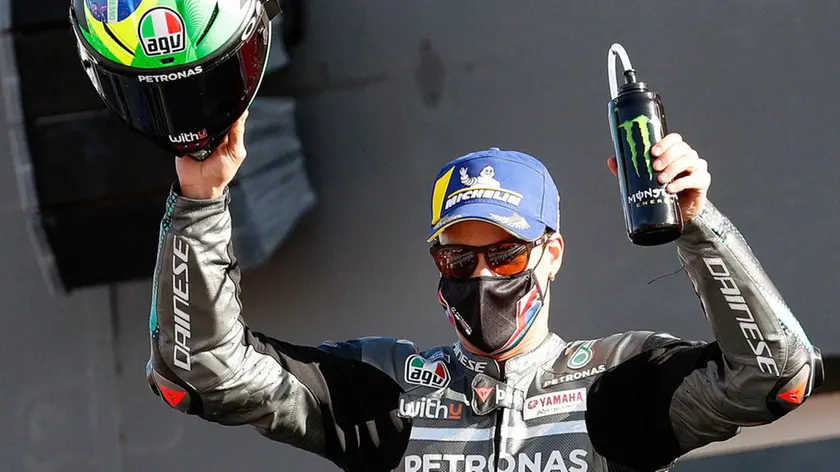 epa08822011 Italian MotoGP rider Franco Morbidelli, Petronas Yamaha SRT team, celebrates on podium after he won the Motul Comunitat Valenciana GP race at Circuit Ricardo Tormo track, in Cheste, Valencia, eastern Spain, 15 November 2020. EPA/Kai Foersterling