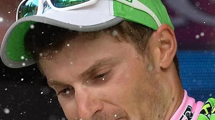 Italian Enrico Battaglin of the Bardiani Csf team celebrates on the podium after winning the 14th stage of the 97th Giro d'Italia cycling race over 164km from Aglie' to Oropa, Italy, 24 May 2014. ANSA/LUCA ZENNARO