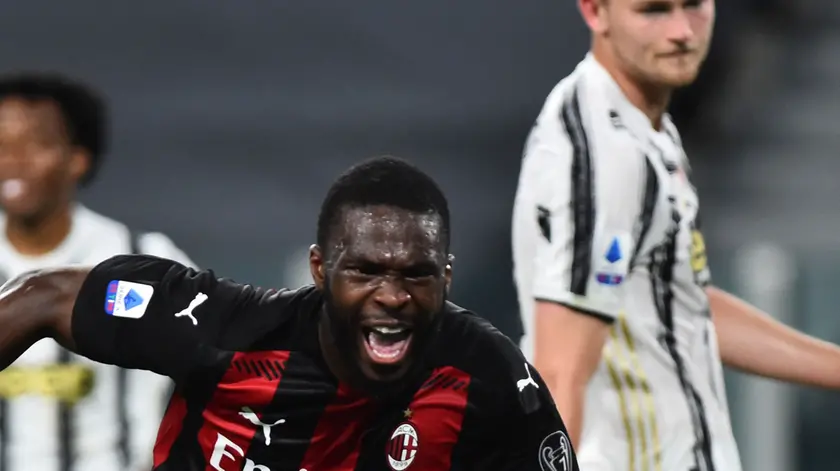 Soccer Football - Serie A - Juventus v AC Milan - Allianz Stadium, Turin, Italy - May 9, 2021 AC Milan's Fikayo Tomori celebrates scoring their third goal REUTERS/Massimo Pinca