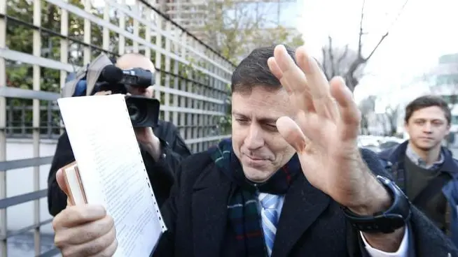 Spanish doctor Eufemiano Fuentes (C) arrives at court to attend the first session of his doping case trial in Madrid, Spain, 28 January 2013. Fuentes is accused of being involved in the doping case 'Puerto Operation'. Allegedly Fuentes had provided doping substances to several cyclists. The trial is the first legal proceedings worldwide against a sport doping plot. ANSAA/JAVIER LIZON