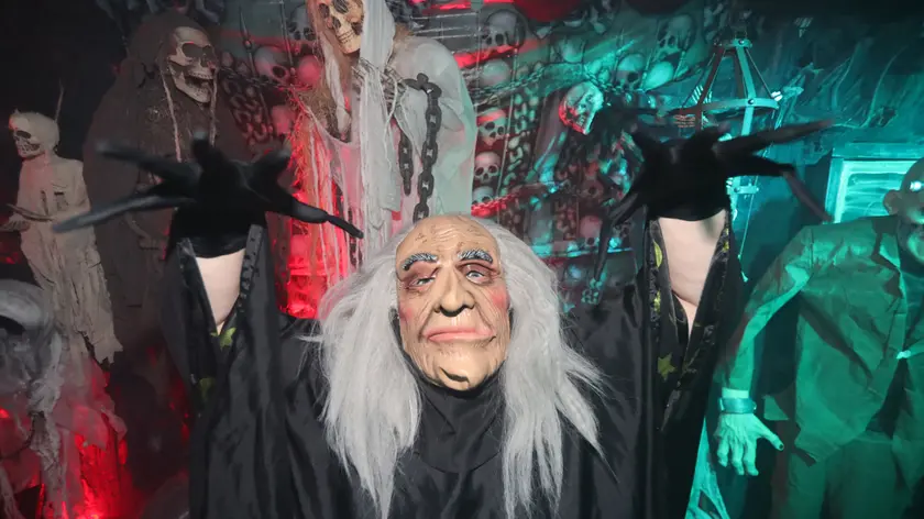 An actor scares visitors viewing Halloween decorations at the home of Ken Carraher in Killiney, Dublin. Mr Carraher created a haunted grotto in aid of the charity Debra Ireland. PRESS ASSOCIATION Photo. Picture date: Wednesday October 25, 2017. Photo credit should read: Niall Carson/PA Wire