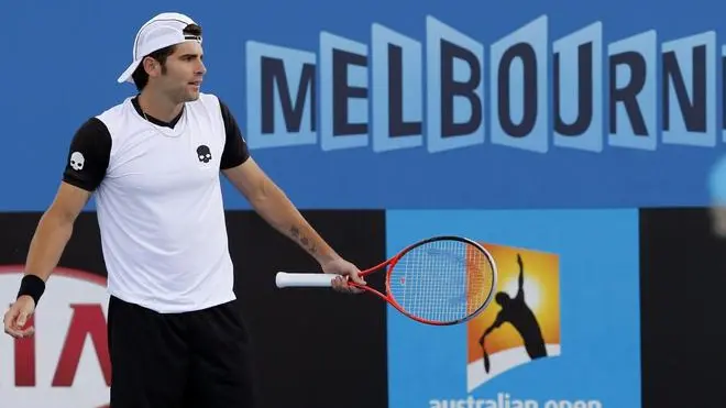 epa03535308 Simone Bolelli of Italy reacts as he loses a game to Jerzy Janowicz of Poland in their 1st round match at the Australian Open Grand Slam tennis tournament in Melbourne, Australia, 14 January 2013. EPA/BARBARA WALTON