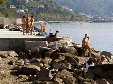 Bagnanti al bivio di Miramare