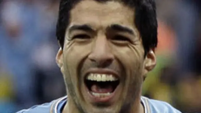 Uruguay's Luis Suarez celebrates after scoring his side's first goal during the group D World Cup soccer match between Uruguay and England at the Itaquerao Stadium in Sao Paulo, Brazil, Thursday, June 19, 2014. (AP Photo/Kirsty Wigglesworth)