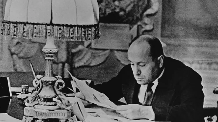 February 1931 --- Italian Premier Benito Mussolini, photographed at his desk in his headquarters in Rome, Italy, February 1931. --- Image by © CORBIS