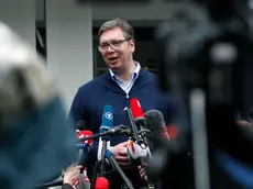 Serbia\'s President Aleksandar Vucic, addresses the media outside a polling station, in Belgrade, Serbia, Sunday, June 21, 2020. Serbia\'s ruling populists are set to tighten their hold on power in a Sunday parliamentary election held amid concerns over the spread of the coronavirus in the Balkan country and a partial boycott by the opposition. (AP Photo/Darko Vojinovic)