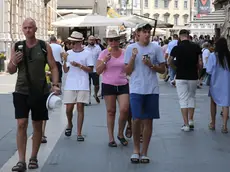 Turisti a Trieste in una foto di repertorio