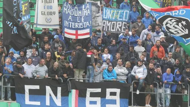Supporters of FC Inter during the Italian Serie A soccer match Cagliari vs FC Inter at Nereo Rocco stadium in Trieste, Italy, 29 September 2013 ANSA/ALBERTO LANCIA