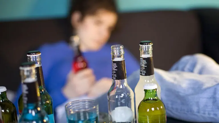 Mandatory Credit: Photo by Jeff Blackler / Rex Features ( 1096103b ) Model Released - Young woman and alcopop drinks Various