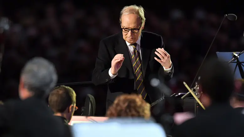 12/11/2016 Citta' del Vaticano. Aula Paolo VI. Concerto per il segno di carita' di papa Francesco per il Giubileo. Nella foto il maestro Ennio Morricone mentre dirige l' Orchestra Roma Sinfonietta