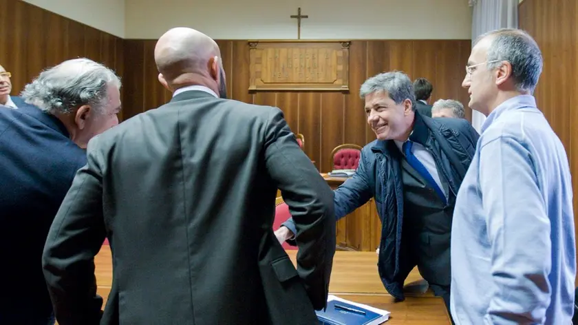 Da sinistra Mastelloni, Tripani (di spalle), Consoli e Frezza in Tribunale (Foto Silvano)