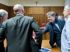 Da sinistra Mastelloni, Tripani (di spalle), Consoli e Frezza in Tribunale (Foto Silvano)