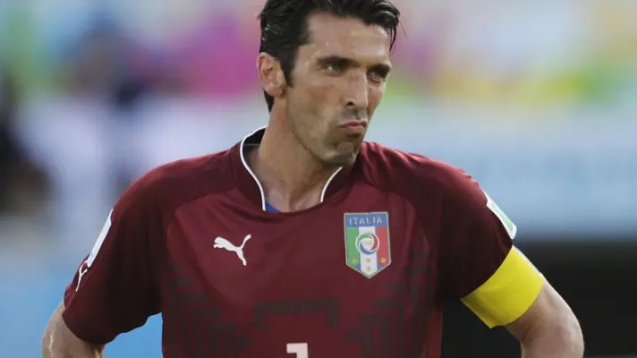 Italy's goalkeeper Gianluigi Buffon stands on the pitch following Uruguay's 1-0 victory over Italy during the group D World Cup soccer match at the Arena das Dunas in Natal, Brazil, Tuesday, June 24, 2014. (AP Photo/Petr David Josek)