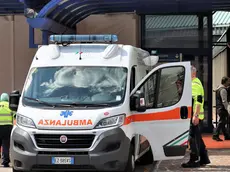 Un'ambulanza all'ospedale di Cattinara, dove il 25enne è stato trasportato d'urgenza in condizioni critiche