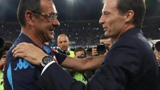 Italian head coach of SSC Napoli Murizio Sarri (L) greets Italian head coach of FC Juventus Massimiliano Allegri during their Italian Serie A soccer match at San Paolo Stadium in Naples, 26 September 2015. ANSA/CESARE ABBATE