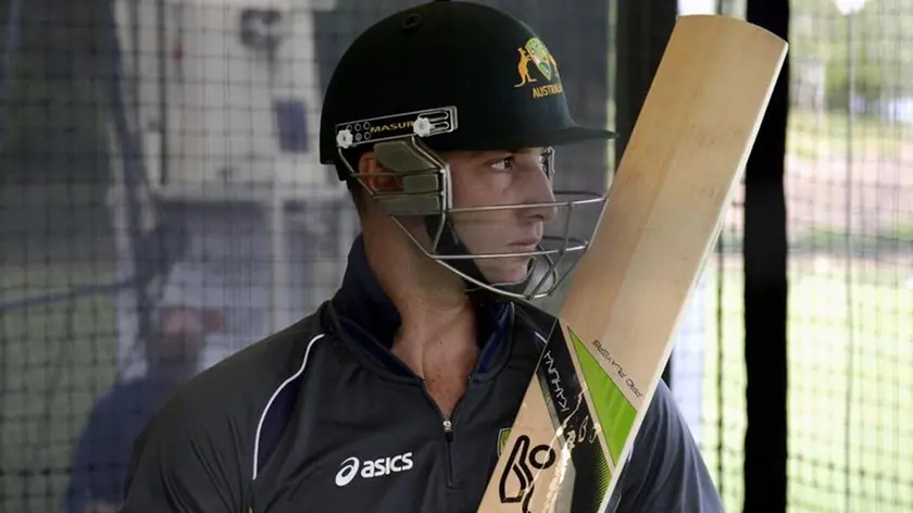 epa04505369 (FILE) A file picture dated 01 May 2013 shows Australian cricketer Phillip Hughes preparing for batting practice in Brisbane, Australia. Australian test cricketer Phil Hughes died on 27 November 2014, two days after being struck on the head by a rising cricket ball, Australia team doctor Peter Brukner said. Hughes, 25, had been in an induced come since 25 November 2014, when he was struck by a fast bouncer just behind the ear and beneath his helmet while playing at the Sydney Cricket Ground (SCG). EPA/DAN PELED AUSTRALIA AND NEW ZEALAND OUT