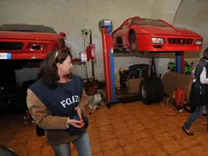 Il garage con le Ferrari di Coretti perquisito dalla polizia