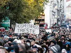 A moment of the 'No Green Pass' rally in Trieste, northern Italy, 06 November 2021. The obligation to have the Green Pass vaccine passport to enter all Italian public and private workplaces came into force last 15 October. ANSA/ PAOLO GIOVANNINI