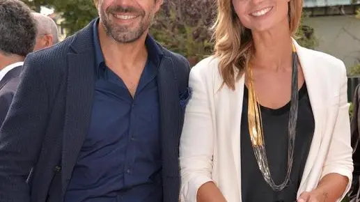 Italian actor Pierfrancesco Favino and his wife Anna Ferzetti pose on red carpet for "Senza Pietà", Venice 30 august 2014. The movie is presented in Orizzonti section at Venice International Film Festival running in Venice from 27 august to 06 september 2014. ANSA/ANDREA MEROLA