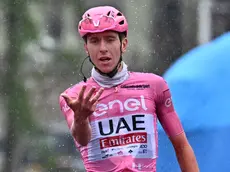 Slovenian rider Tadej Pogacar of Uae Team Emirates celebrates after crossing the finish line and win the 16th stage of the 107 Giro d'Italia 2024, cycling race over 202 km from Livigno to Santa Cristina Valgardena, Italy, 21 May 2024. ANSA/LUCA ZENNARO