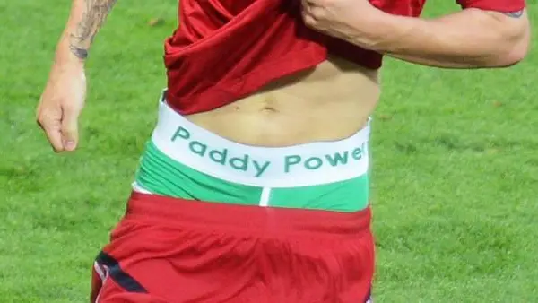 epa03266355 (FILE) Nicklas Bendtner of Denmark celebrates after scoring the 2-2 equalizer during the Group B preliminary round match of the UEFA EURO 2012 between Denmark and Portugal in Lviv, Ukraine, 13 June 2012. UEFA opened proceedings Friday June 15th against Denmark striker Nicklas Bendtner for revealing the name of an Irish bookmaker on his underpants while celebrating a goal in the Euro 2012 match against Portugal. European football's organizing body said Bendter was being charged for "improper conduct" at Wednesday's group B match in Lviv. UEFA's control and disciplinary body will deal with the case on Monday. UEFA rules ban any advertising on players' kits during the tournament. Bendtner lowered his football shorts to reveal a pair of boxer shorts with the sponsor's name on the waistband after scoring for Denmark. He claimed he did not realize he was breaking any rules. "It is just a pair of lucky boxer shorts that I used in the first game as well and have used before the tournament," he was quoted as saying. EPA/GEORGI LICOVSKI UEFA Terms and Conditions apply http://www.epa.eu/downloads/UEFA-EURO2012-TCS.pdf