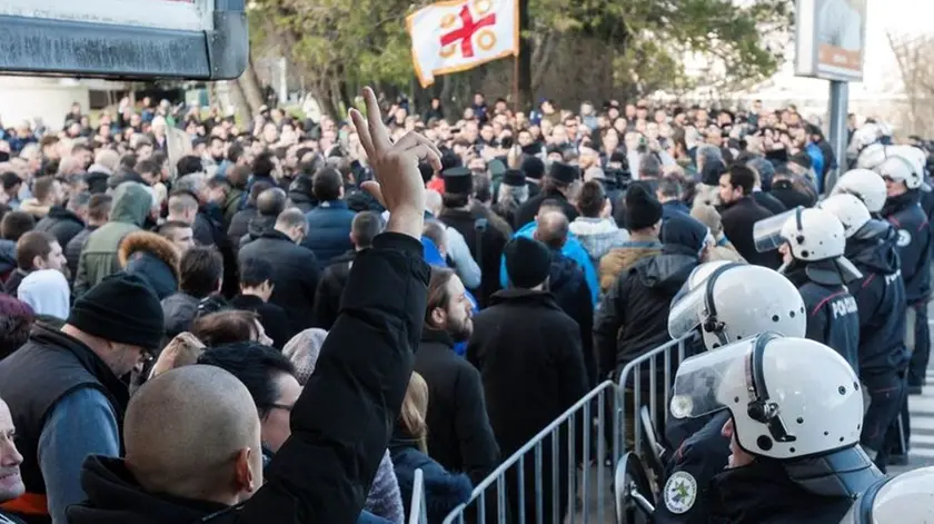 Serbian Orthodox Church clergy and believers hold a service on a bridge near the parliament, ahead of a vote for a bill on 'Religious freedoms and legal rights of religious organizations' in Podgorica, Montenegro December 26, 2019. REUTERS/Stevo Vasiljevic