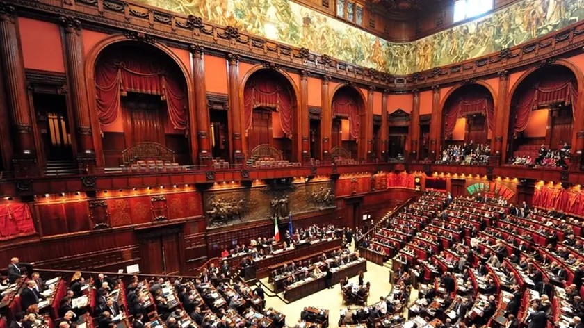 View of deputies gathered in the Montecitorio Palace, the Italian parliament, on April 13, 2011 during a debate in the Lower House about a law that would cut the statute of limitations in certain cases of trials. The law, if passed in the parliament, would have effect to end a corruption trial in Milan, in which Italy's PM Silvio Berlusconi is accused of bribing British lawyer David Mills. The lower house is expected to vote late today and the Senate in coming weeks. AFP PHOTO / ALBERTO PIZZOLI (Photo credit should read ALBERTO PIZZOLI/AFP/Getty Images)