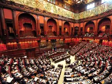 View of deputies gathered in the Montecitorio Palace, the Italian parliament, on April 13, 2011 during a debate in the Lower House about a law that would cut the statute of limitations in certain cases of trials. The law, if passed in the parliament, would have effect to end a corruption trial in Milan, in which Italy's PM Silvio Berlusconi is accused of bribing British lawyer David Mills. The lower house is expected to vote late today and the Senate in coming weeks. AFP PHOTO / ALBERTO PIZZOLI (Photo credit should read ALBERTO PIZZOLI/AFP/Getty Images)